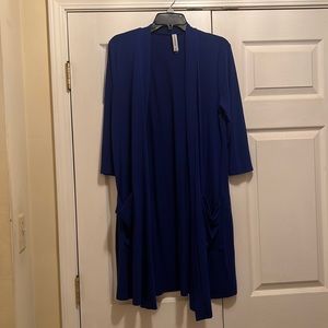 Excellent condition. Royal blue cardigan with 3/4 sleeves. Size m.